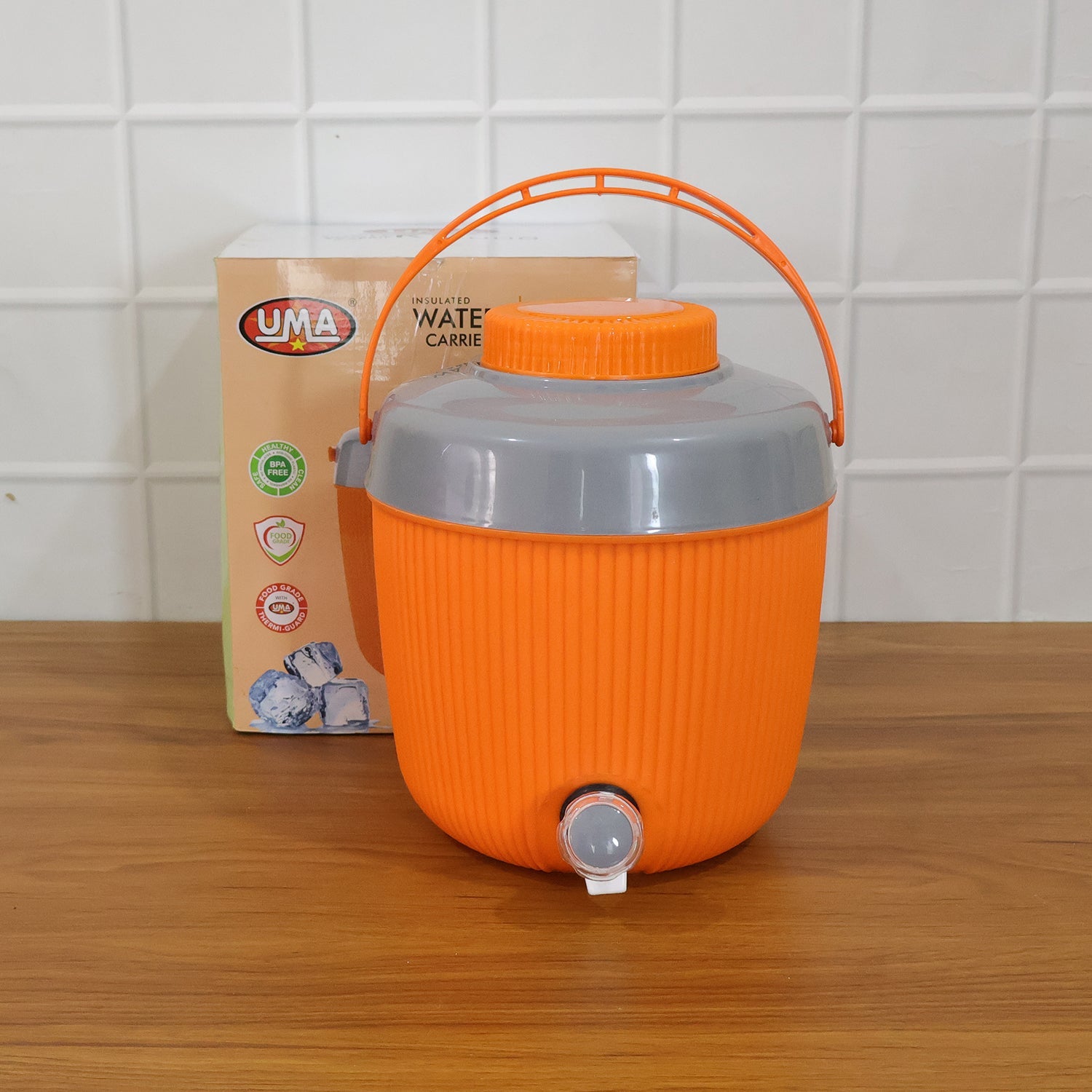Detail of the base and tap mechanism on the ChillPour travel water dispenser.