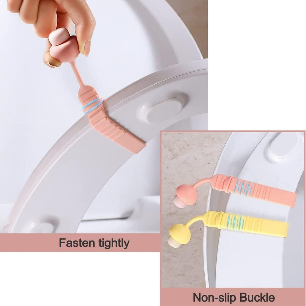 Reusable silicone toilet seat lifter securely attached to a toilet seat.