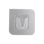 Transparent self-adhesive wall hook ready for easy peel-and-stick application.