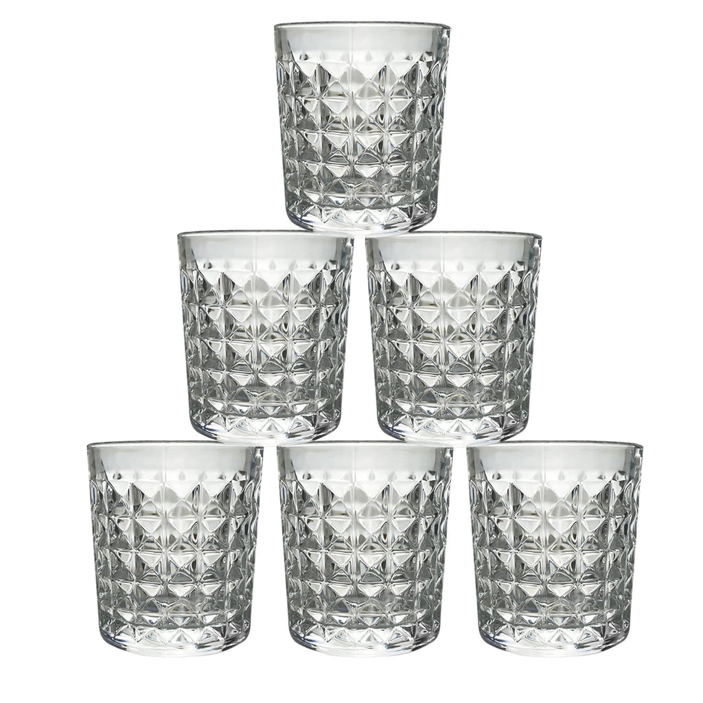 A stack of elegant diamond-cut glass tumblers, illustrating their compact storage and design.