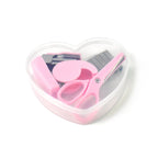 The portable stationery kit with all its components, including paper clips, ready for use.