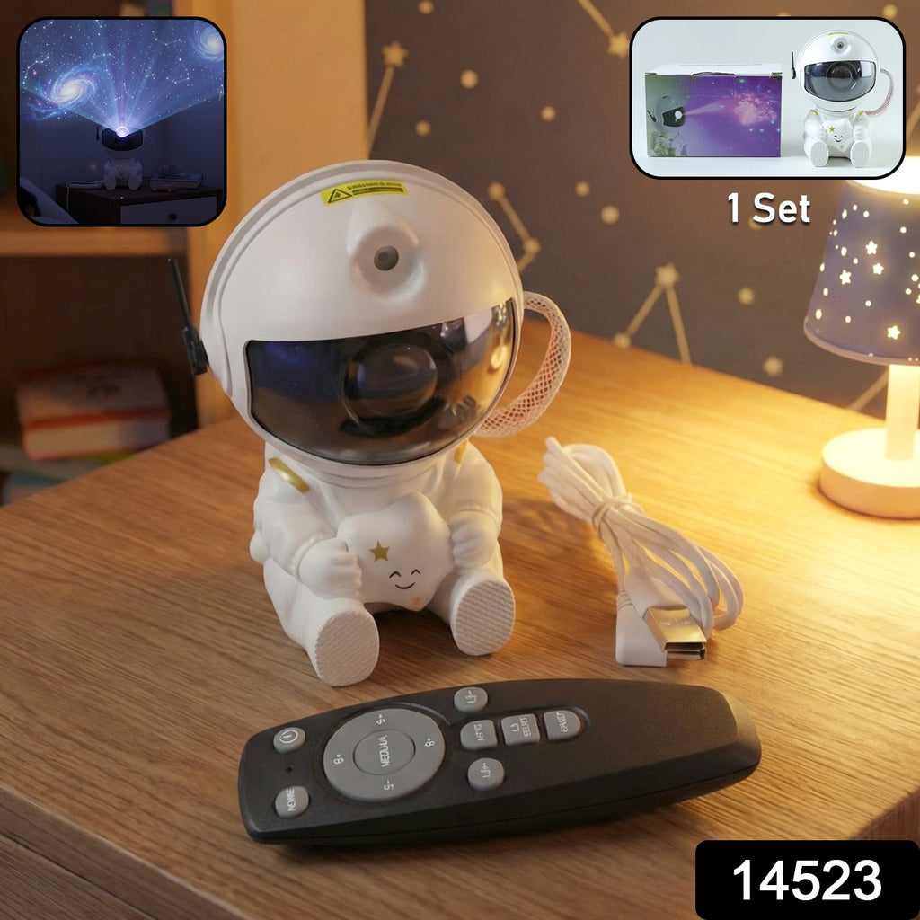 Astronaut galaxy star projector night light with remote control on table