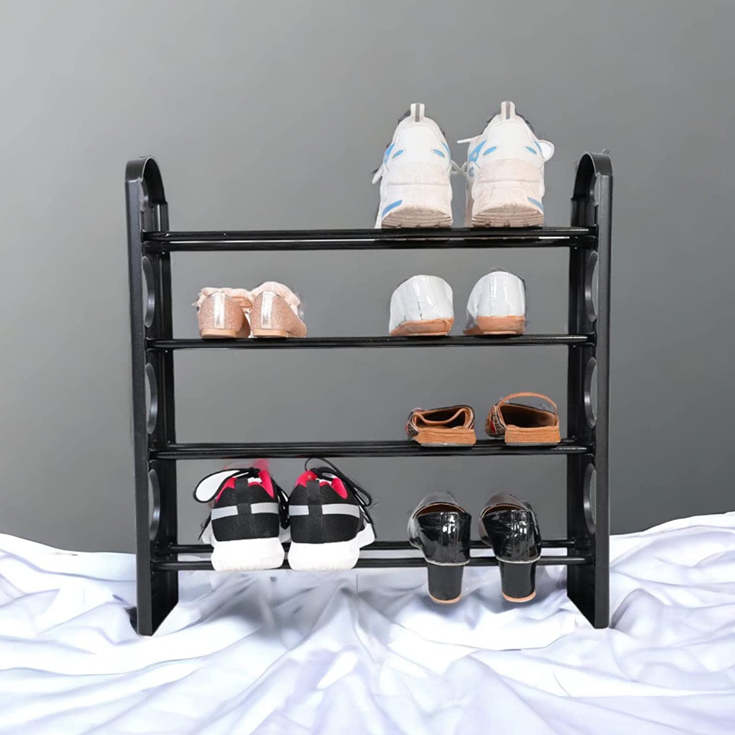 Front view of the space-efficient 4-shelf shoe rack, ideal for decluttering entryways.
