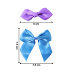 Detailed view of satin ribbon bow hair clip with smooth finish
