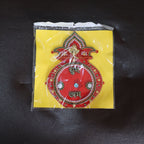 Traditional Kalash wall hanging adorned with beads and pearl-like accents for festivals