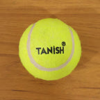 Tennis ball with bright color for easy visibility during outdoor games