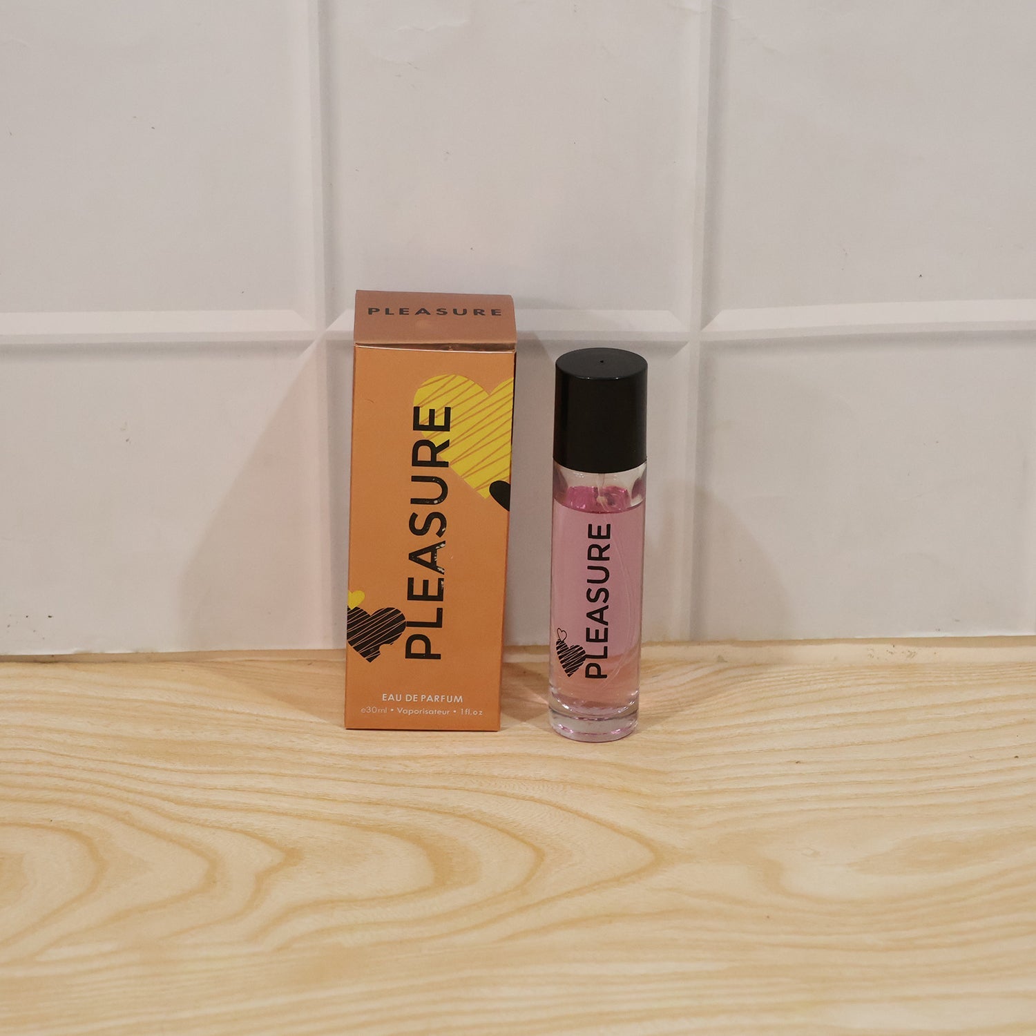 Various angles of Pleasure Eau De Parfum bottle