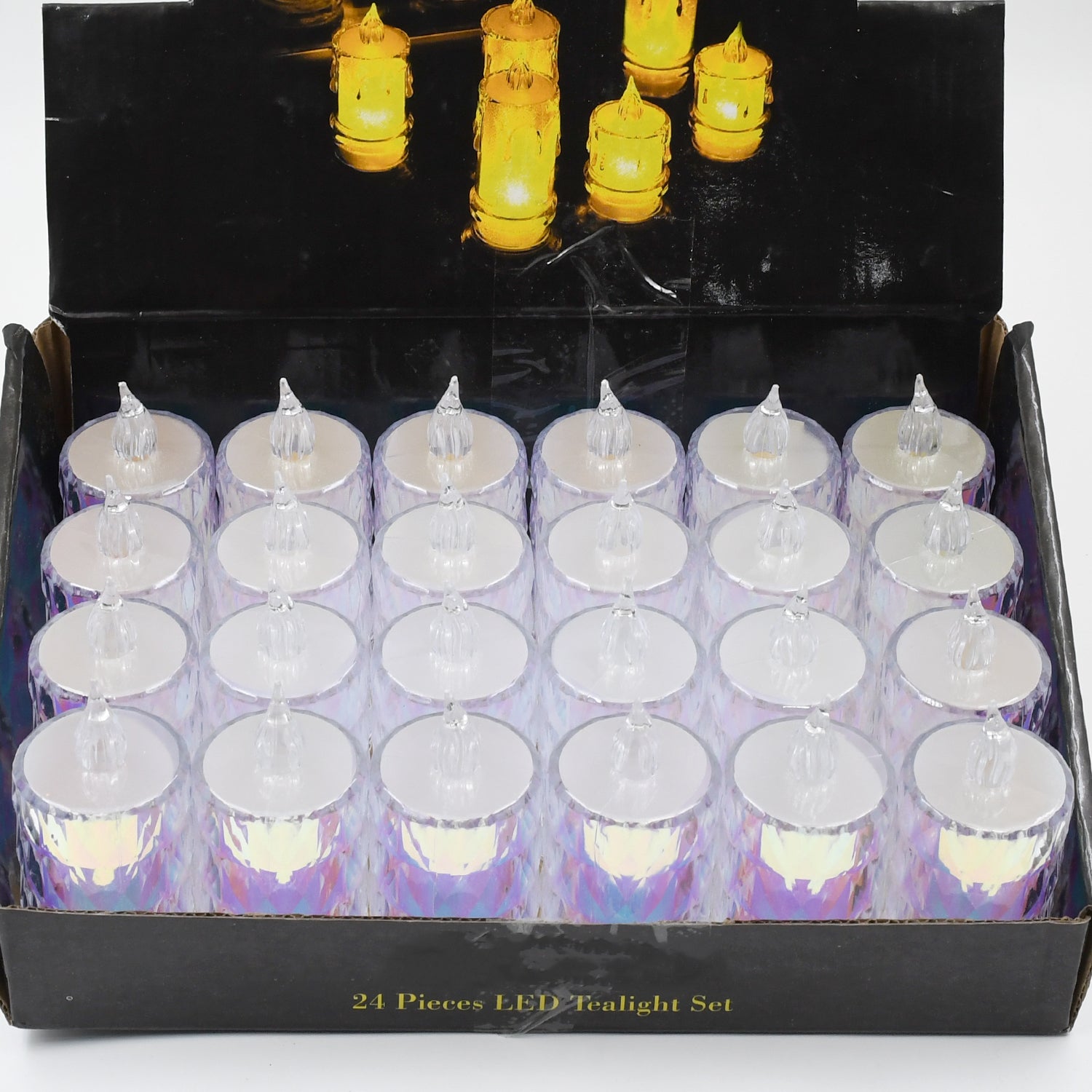 A glowing LED tea light candle showcasing its realistic flicker effect.