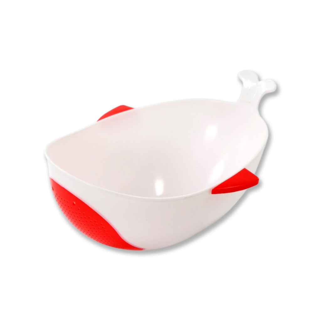 Ergonomic fish-shaped rice drainer in vibrant color for kitchen use.