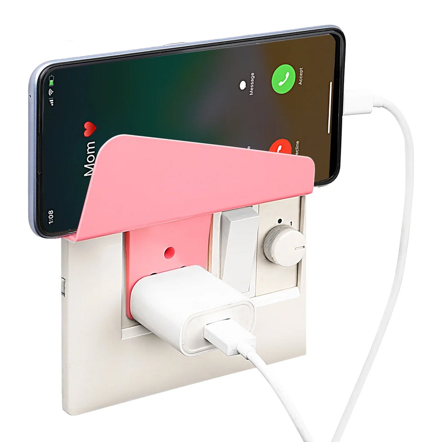 User effortlessly placing a smartphone onto the Gambit wall phone holder for charging.