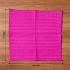Microfiber cleaning cloth in use wiping a smooth surface