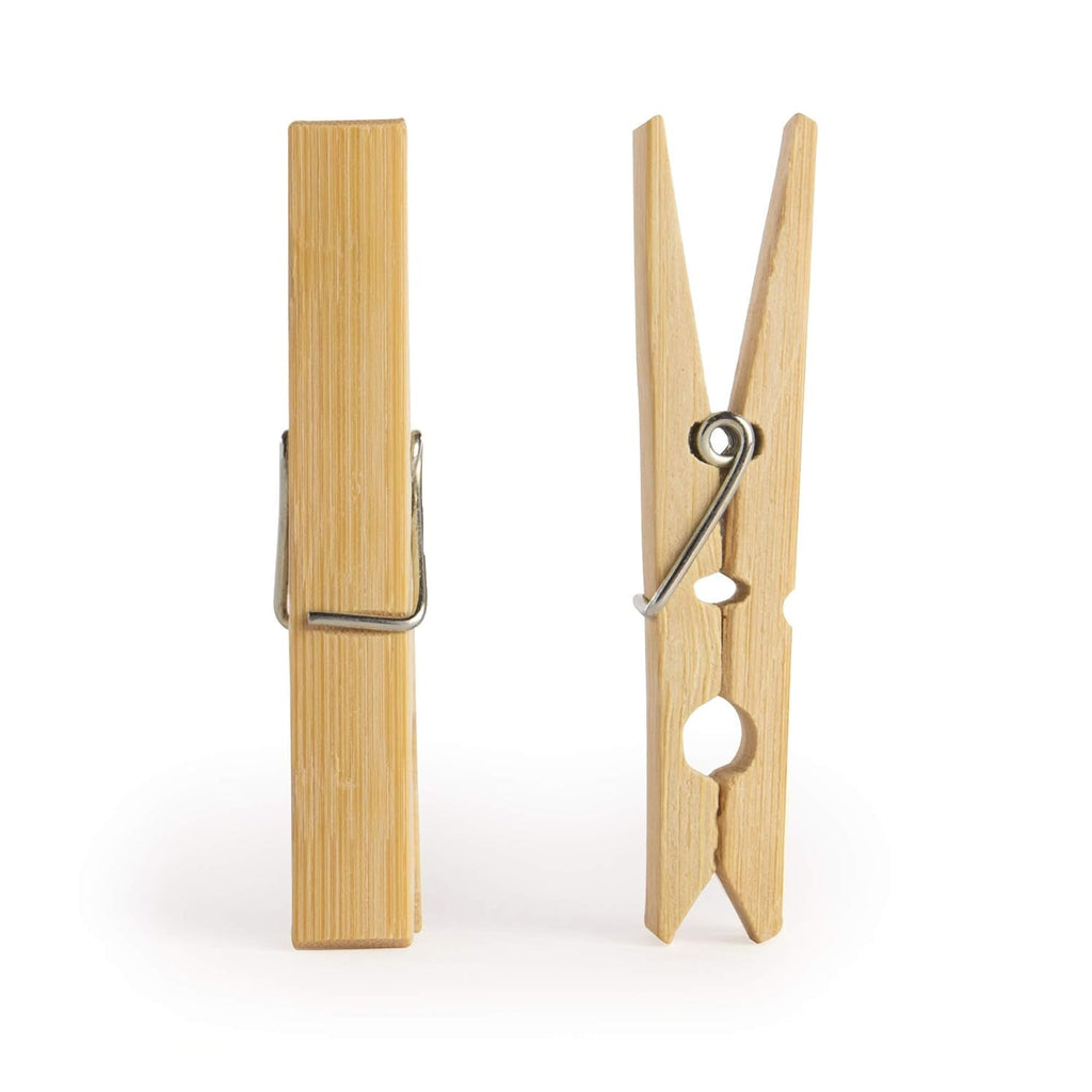 Bamboo cloth clips holding a light cotton fabric, perfect for daily laundry.