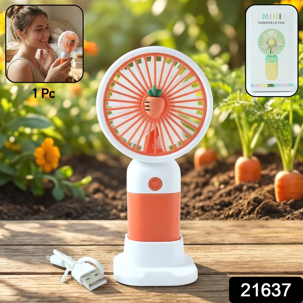 Mini handheld fan being used to cool in hand