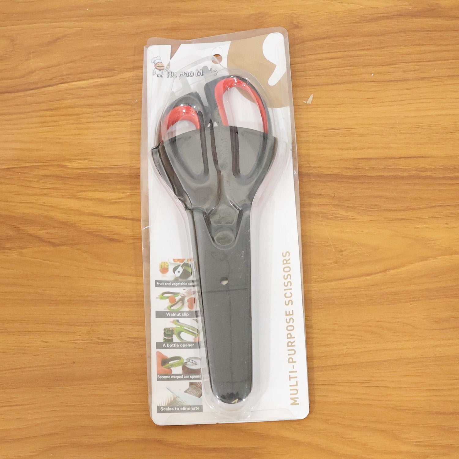 Kitchen scissors shown open highlighting blades and handle