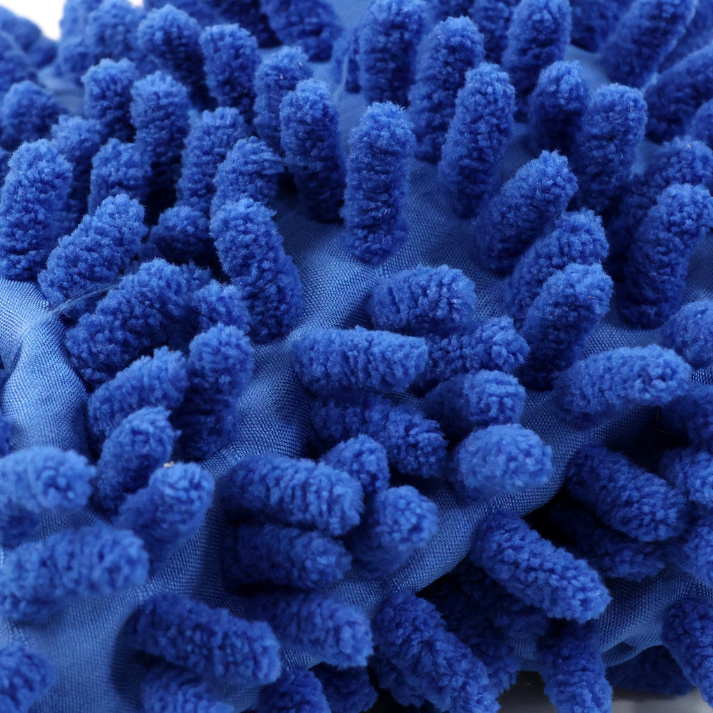 Microfiber wash mitt gently cleaning a car's painted surface.