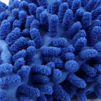 Microfiber wash mitt gently cleaning a car's painted surface.