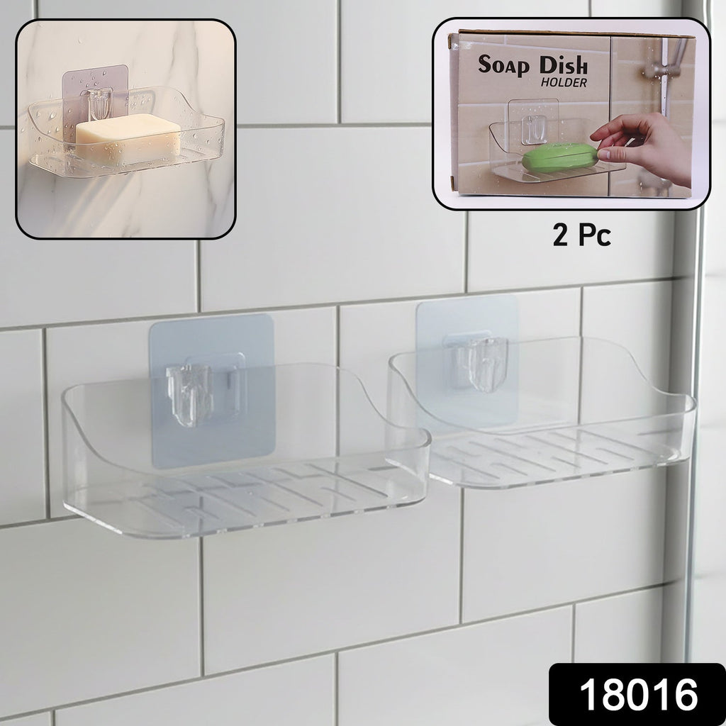 Close-up view of clear transparent soap dish holder mounted on bathroom wall