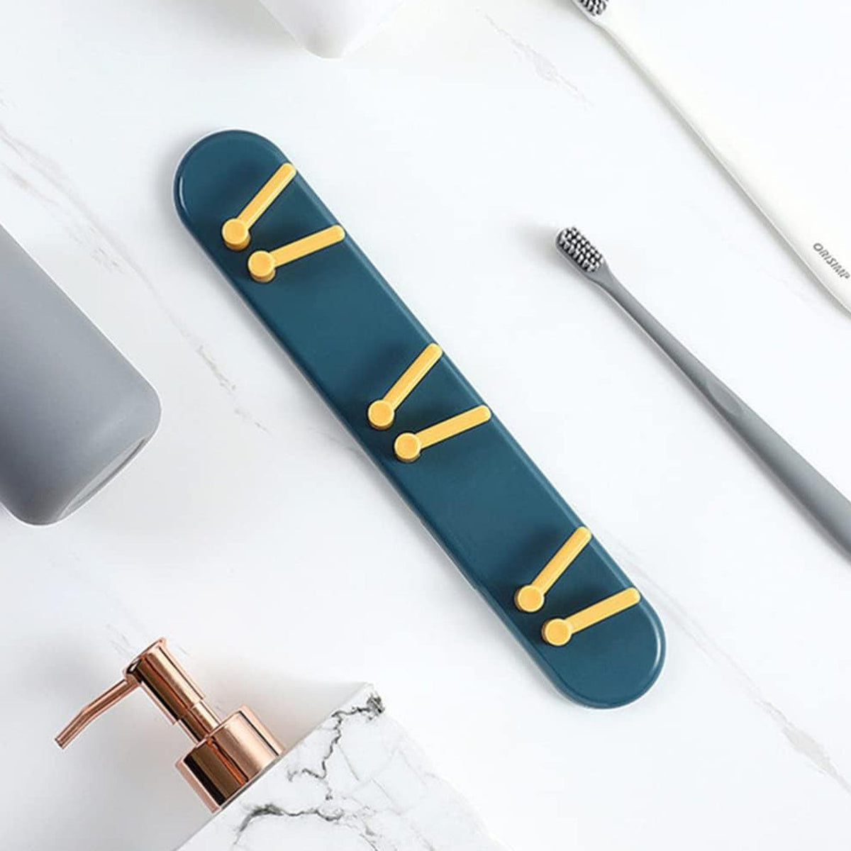 Efficient wall-mounted toothbrush holder with shelves and hooks for Indian bathrooms.