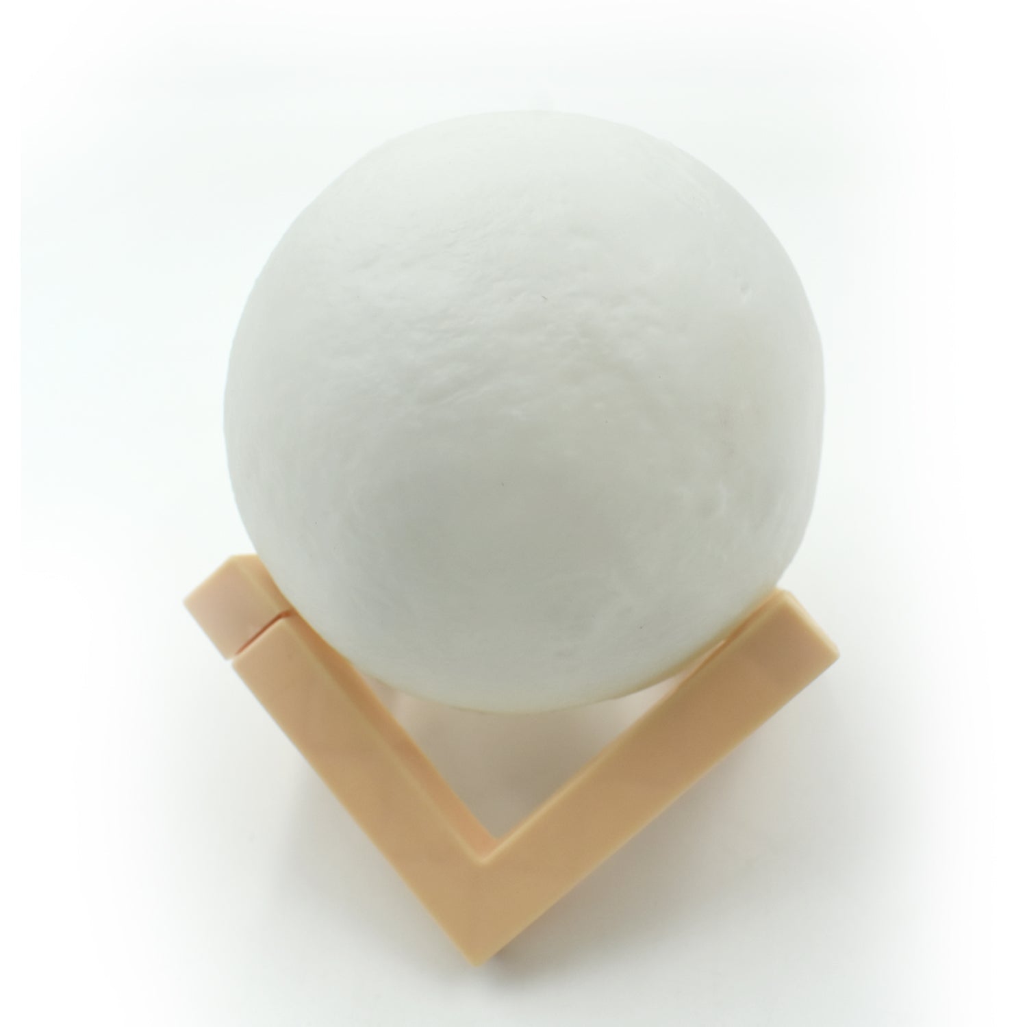 Close-up of the 3D moon lamp showcasing its detailed surface and touch sensor.
