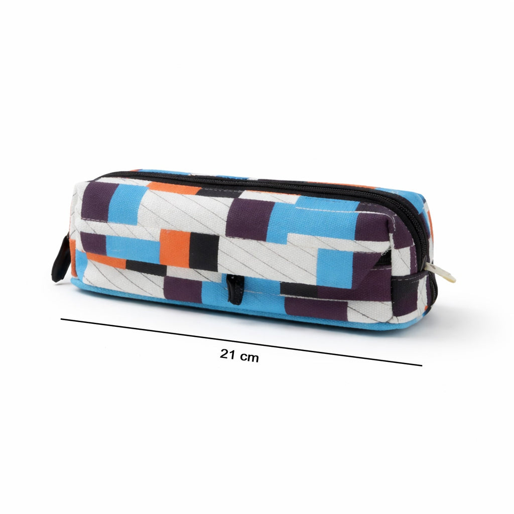 Interior compartment of pencil pouch showing space for pens and accessories
