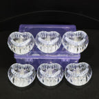 Battery powered LED crystal tealight candles set illuminating room