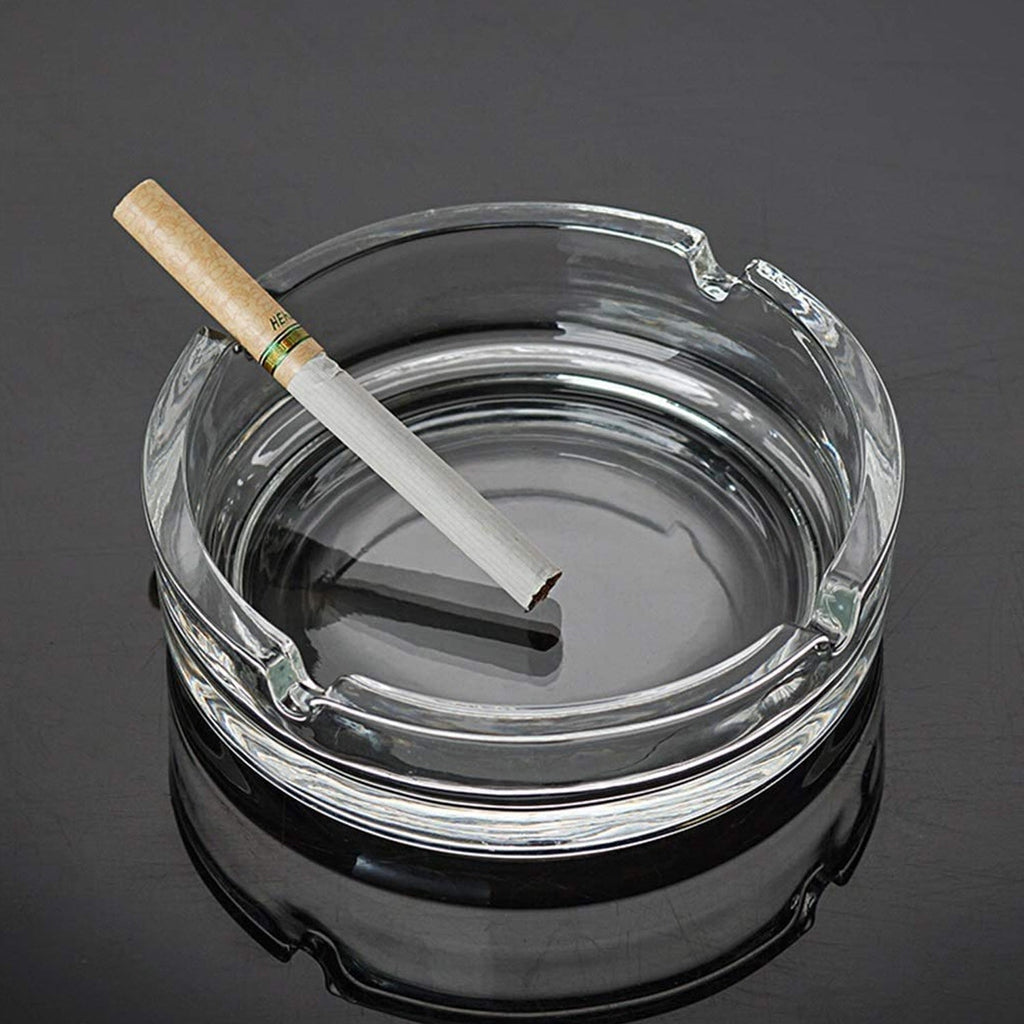 Sleek and sturdy crystal glass ashtray, a blend of form and function.