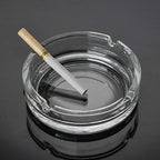 Sleek and sturdy crystal glass ashtray, a blend of form and function.