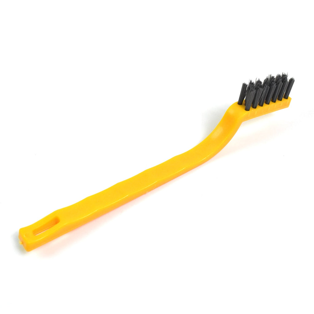Soft-bristled mini nylon cleaning brush for gentle yet powerful scrubbing.