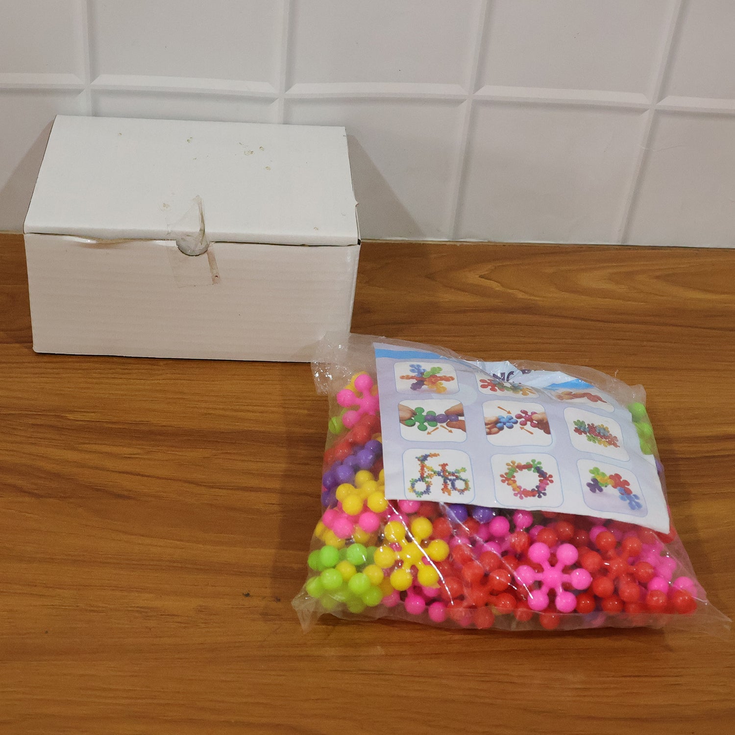 Kids playing joyfully with colourful building blocks educational toy set
