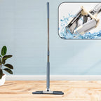Velvet Wipe Flat Mop with 360-degree rotating head, shown cleaning a floor.