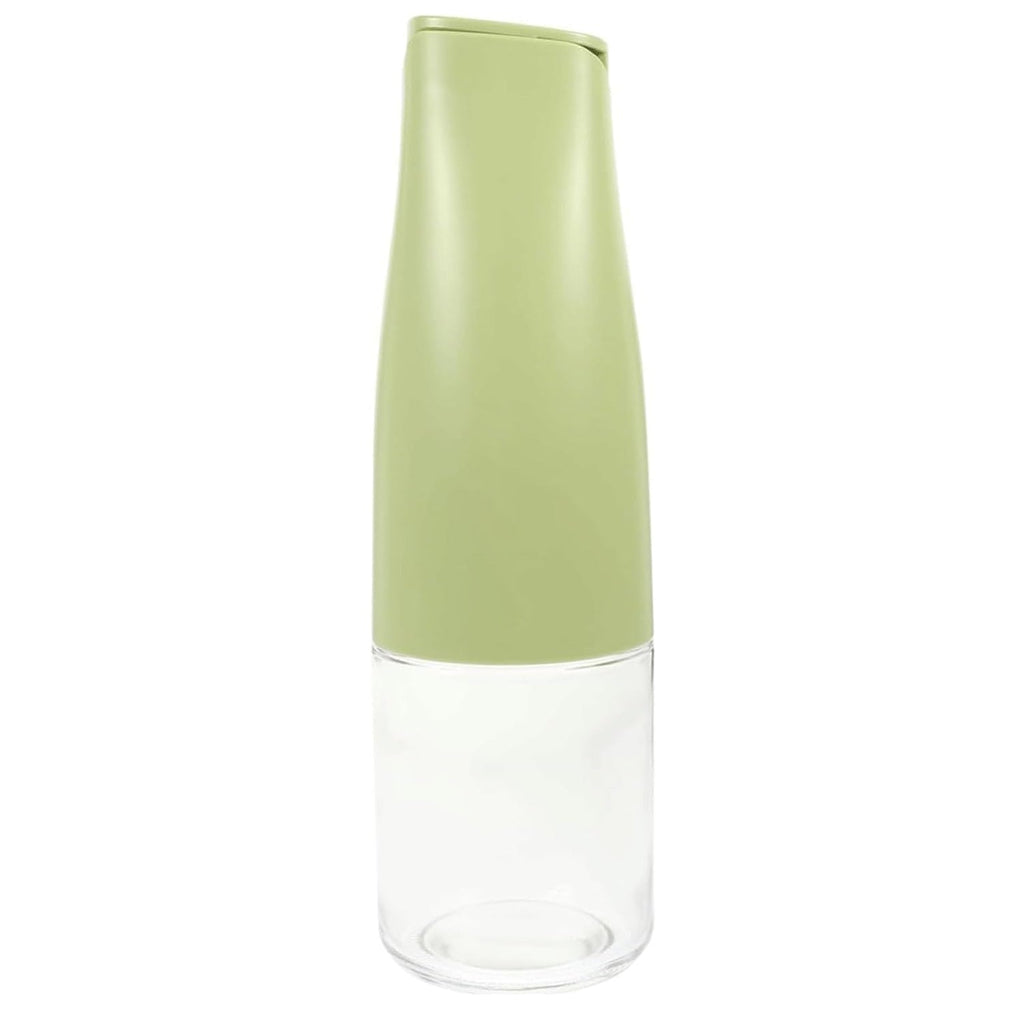 Empty 500ml oil dispenser bottle, highlighting its wide mouth for easy cleaning.