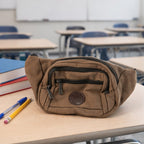 Compact waist pouch in brown canvas perfect for travel and sports use