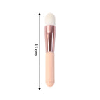 Ergonomic handle of soft makeup brush offering comfortable grip for face blending