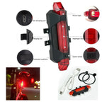 Rear view of bright red bicycle LED tail light illuminated during ride