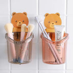 Wall-mounted kid’s toothbrush holder with teddy bear design