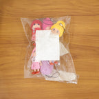 Trendy mini doll keychain as a bag accessory