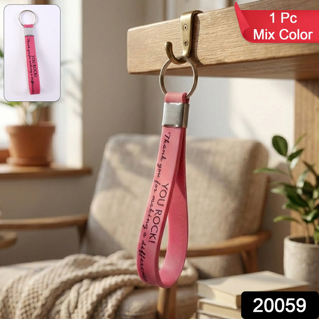 Silicone wrist strap keychain attached securely to a set of keys