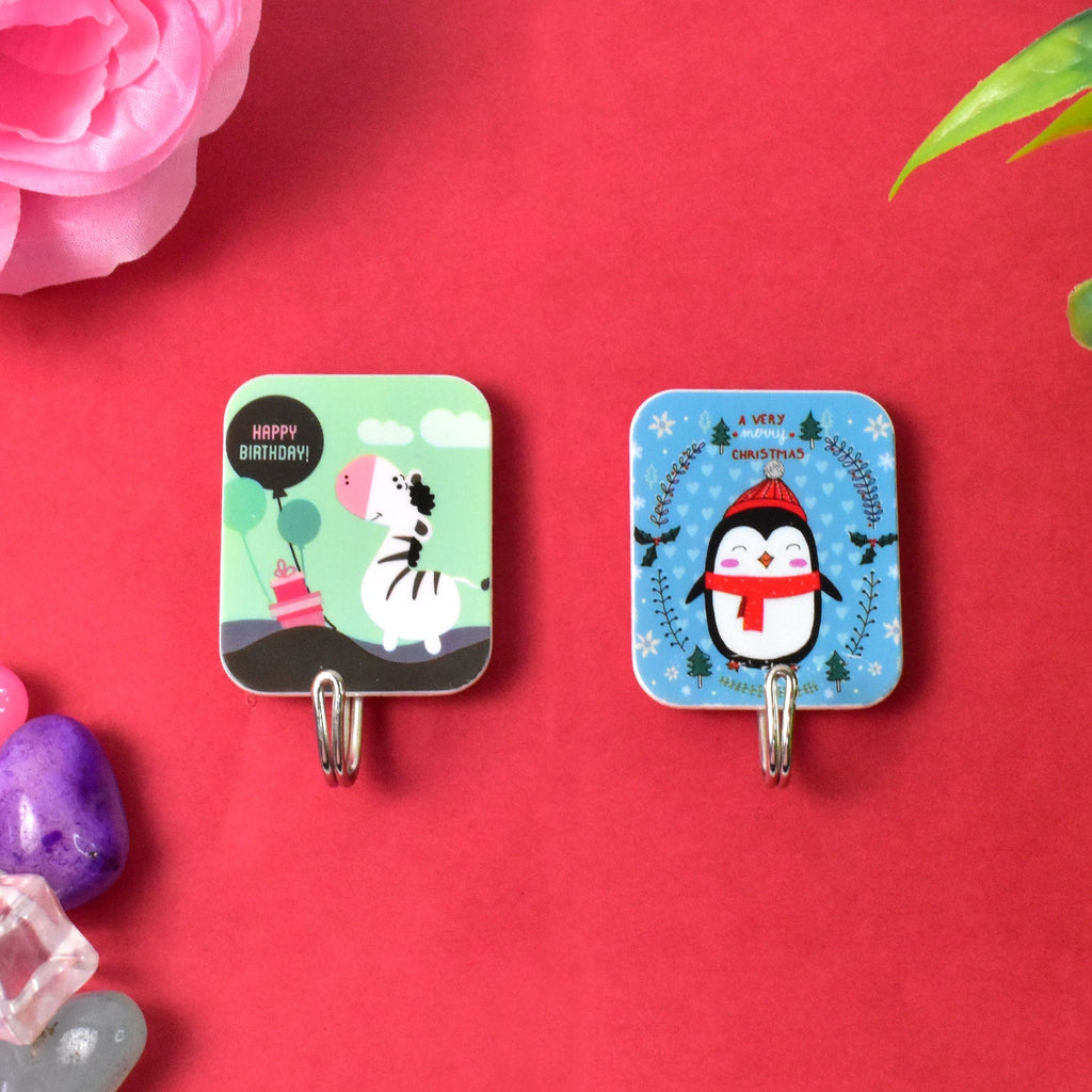 Jolly cartoon design on self-adhesive hook fixed on wall surface