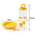 Bird feeder hanging on balcony with birds feeding