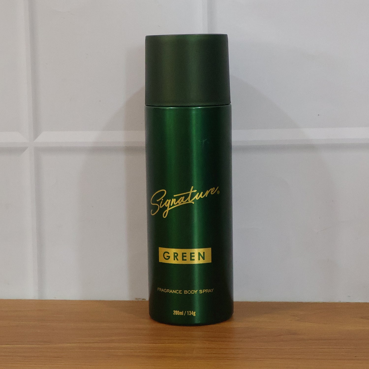Stylish green fragrance deodorant spray can