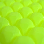 A stream of water filling the easy release ice tray cavities.
