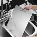 Modern kitchen stainless steel cutting board for versatile food preparation