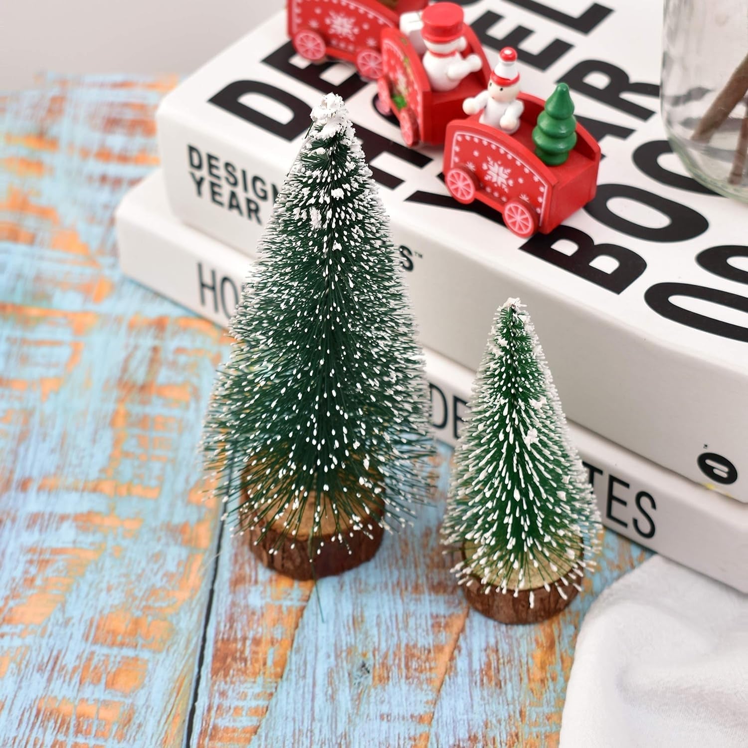 Compact green fir artificial tree with snow effect for holiday home decor
