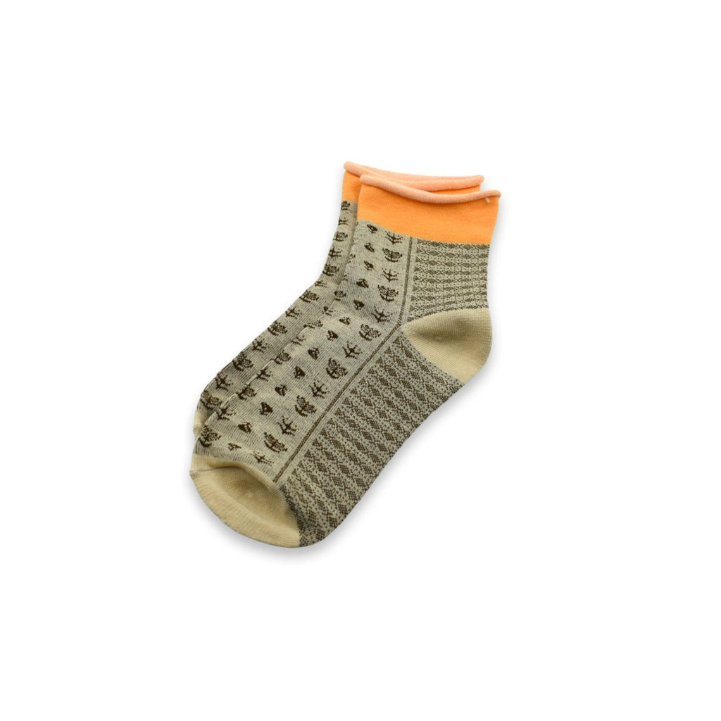 Stacked grey ankle socks, ready for comfortable daily wear.