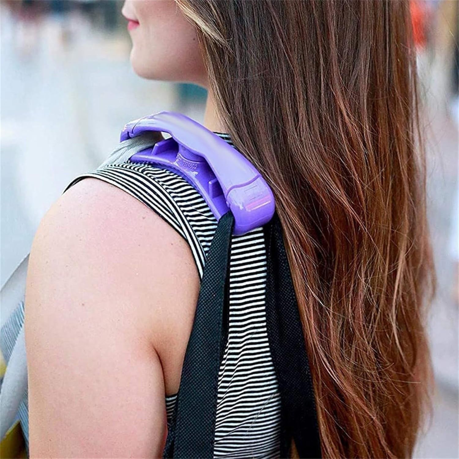 Practical bag holder used to transport heavy paint cans effortlessly.