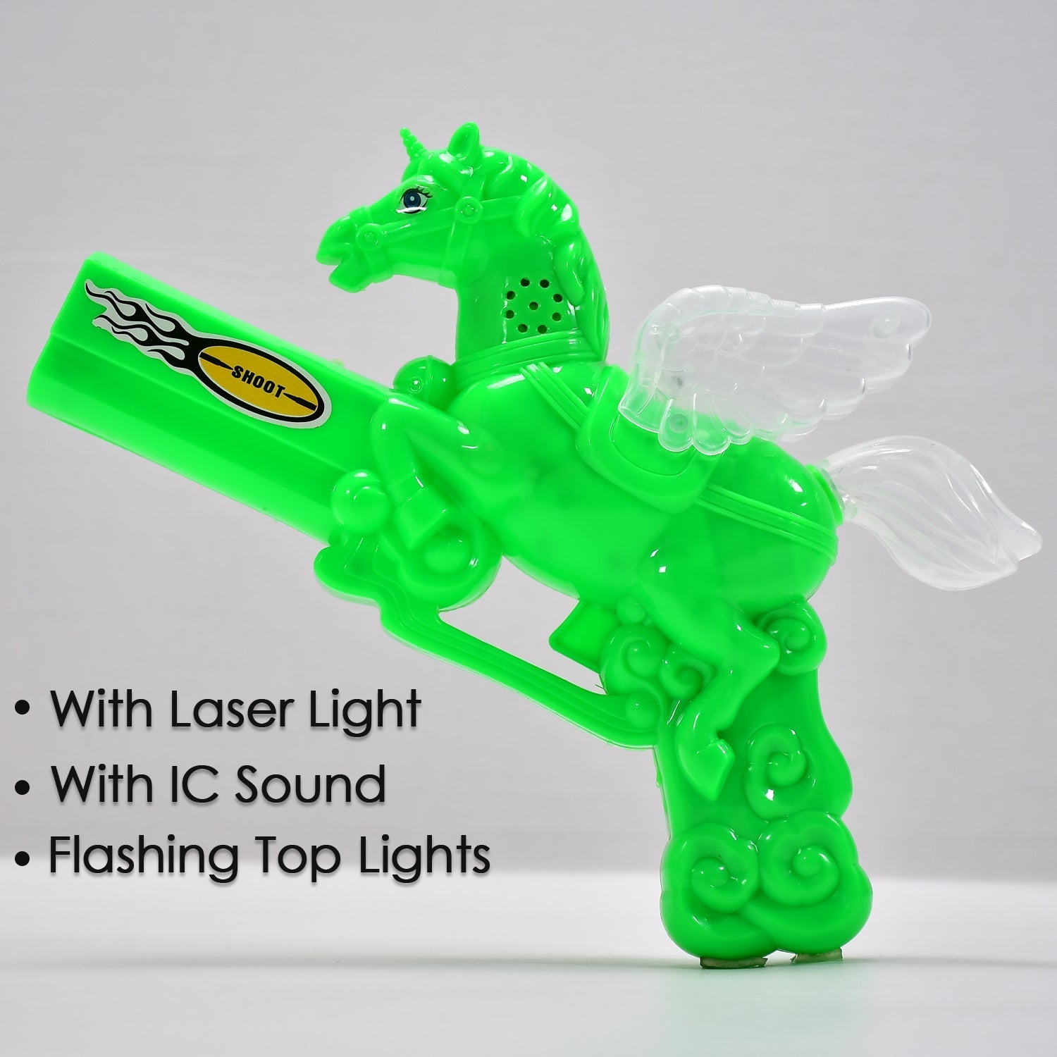 Child playing with the laser light toy gun, creating colorful light patterns.