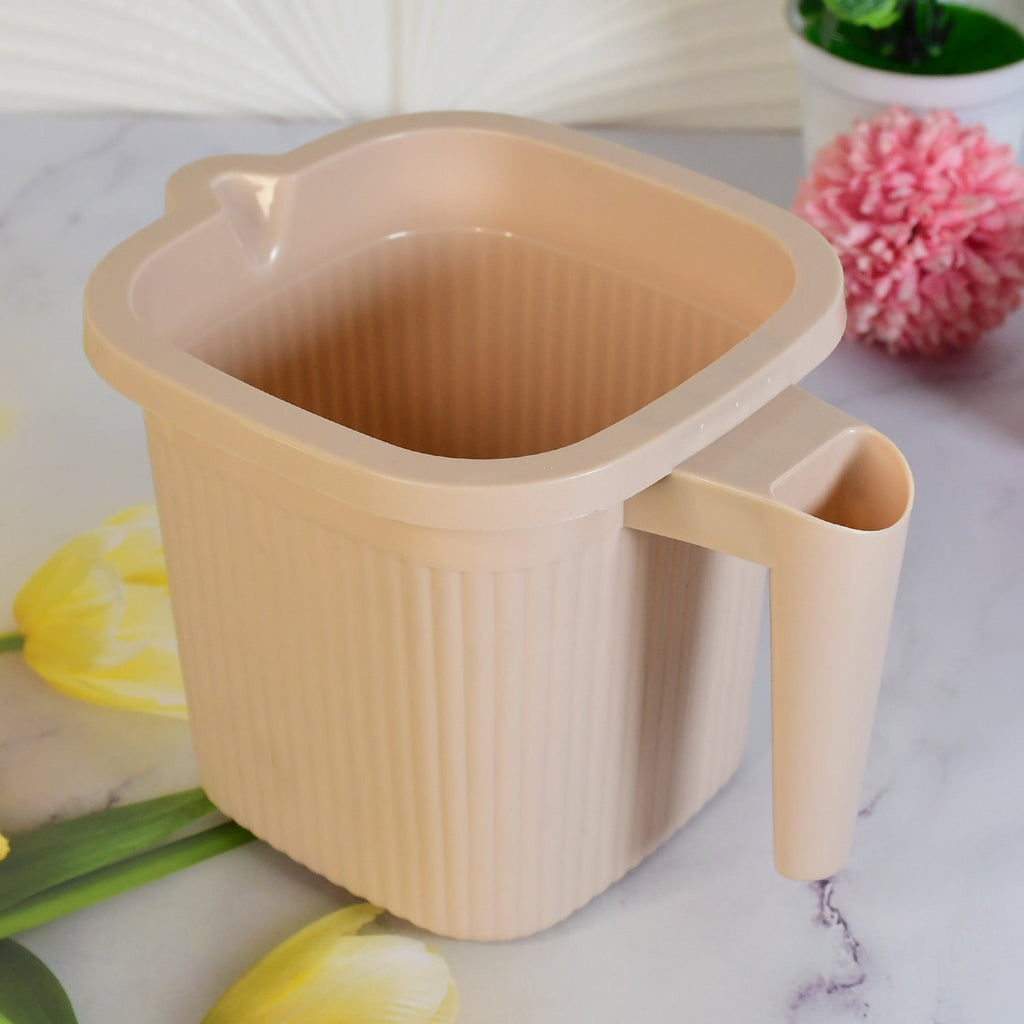 Vibrant blue Plastic Bath Mug, showcasing the ergonomic design and 1000ml capacity.
