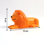 Close-up of lion dashboard toy showing adhesive base for stability