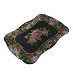 Elegant stainless steel serving tray holding cups and snacks, ready for guests.