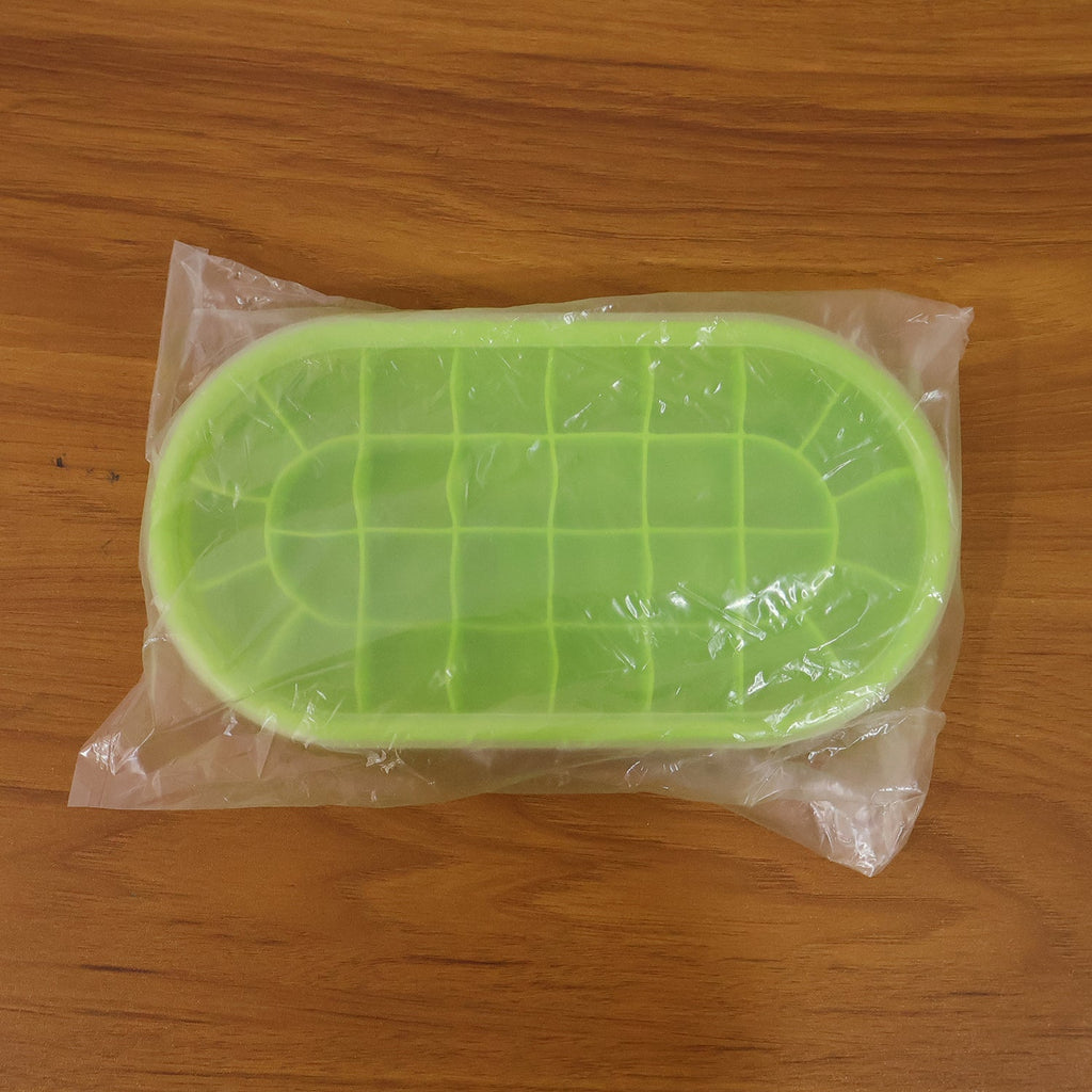 Oval ice mold tray perfect for cocktails and cold drinks